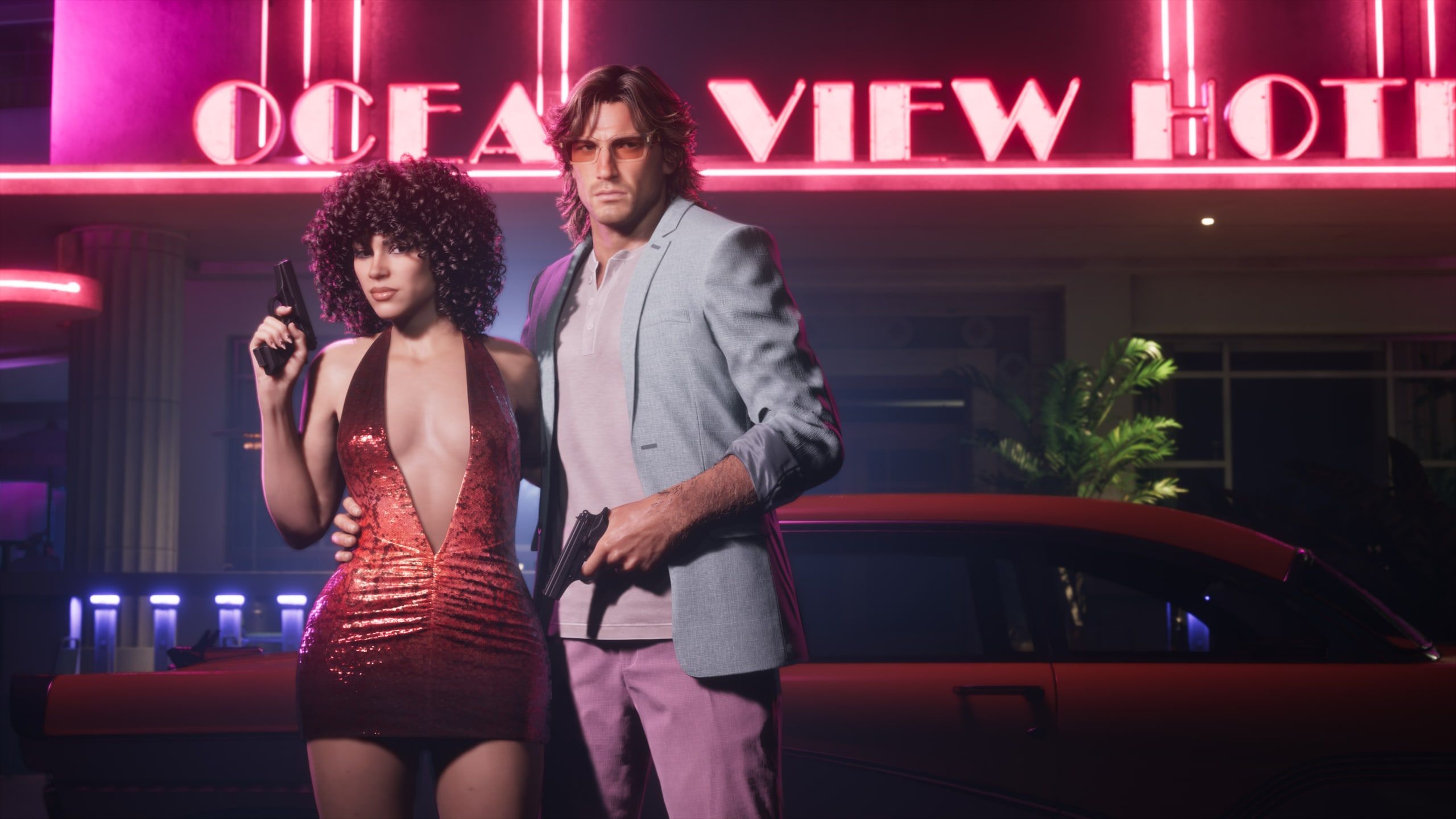Jason and Lucia in retro Vice City looks under the Ocean View Hotel neon.